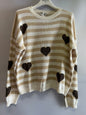 Gilet beige con cuori